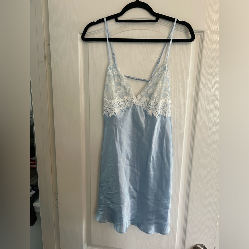 Lingerie. Pale blue gown with ivory robe